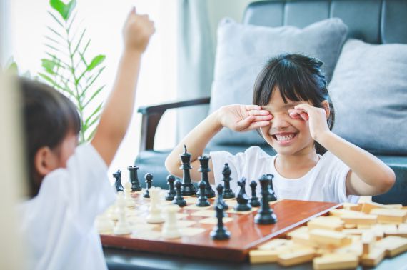 kids enjoying chess